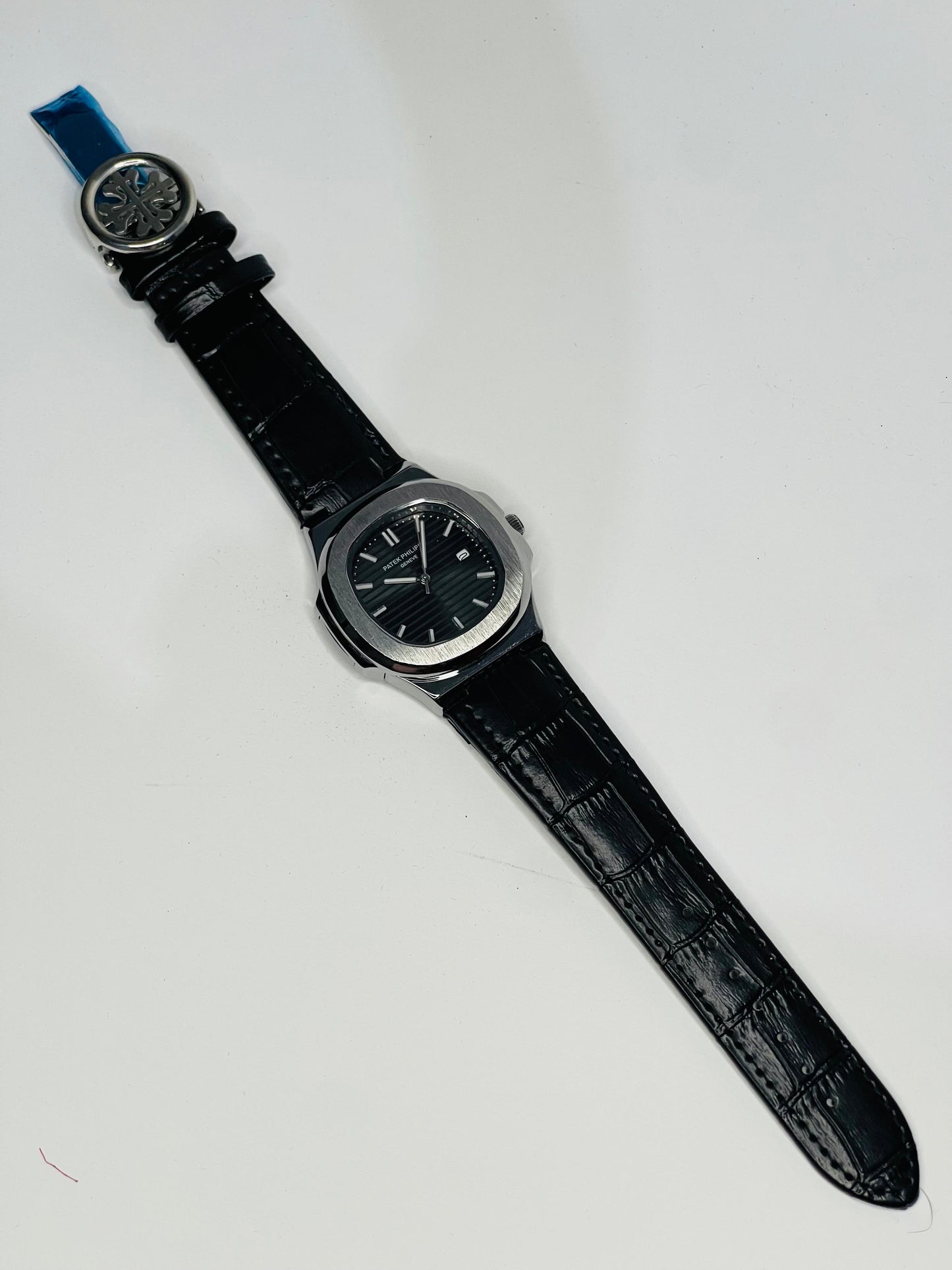 "Patek Philippe black dial with black leather strap watch"