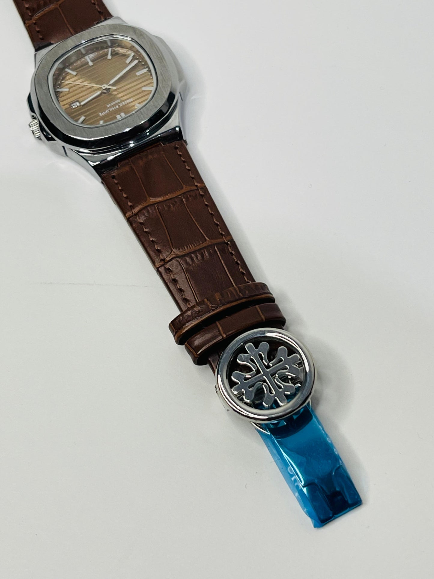 "Patek Philippe walnet dial with brown leather strap watch"