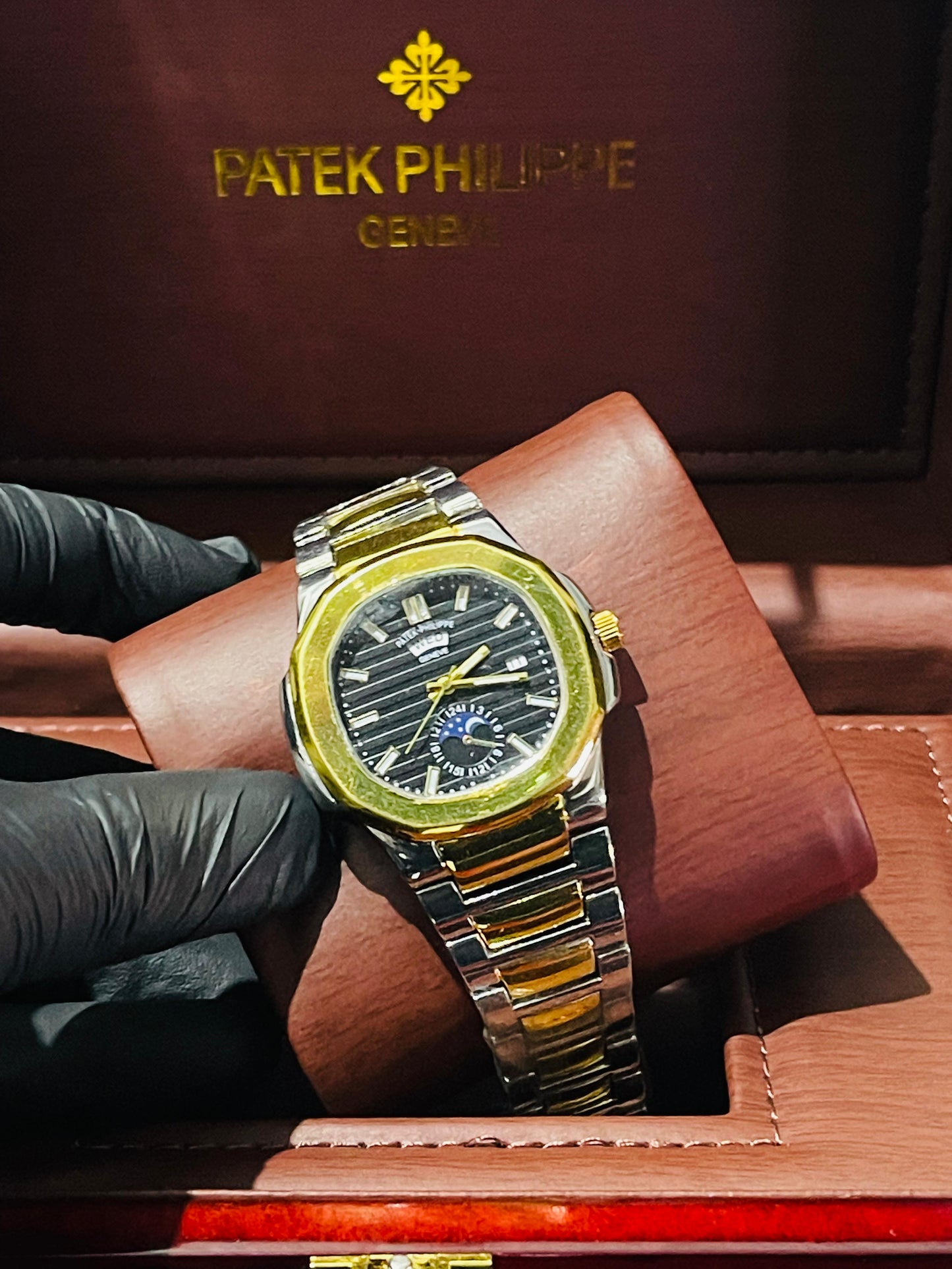 "PP Silver with Black dial with date"