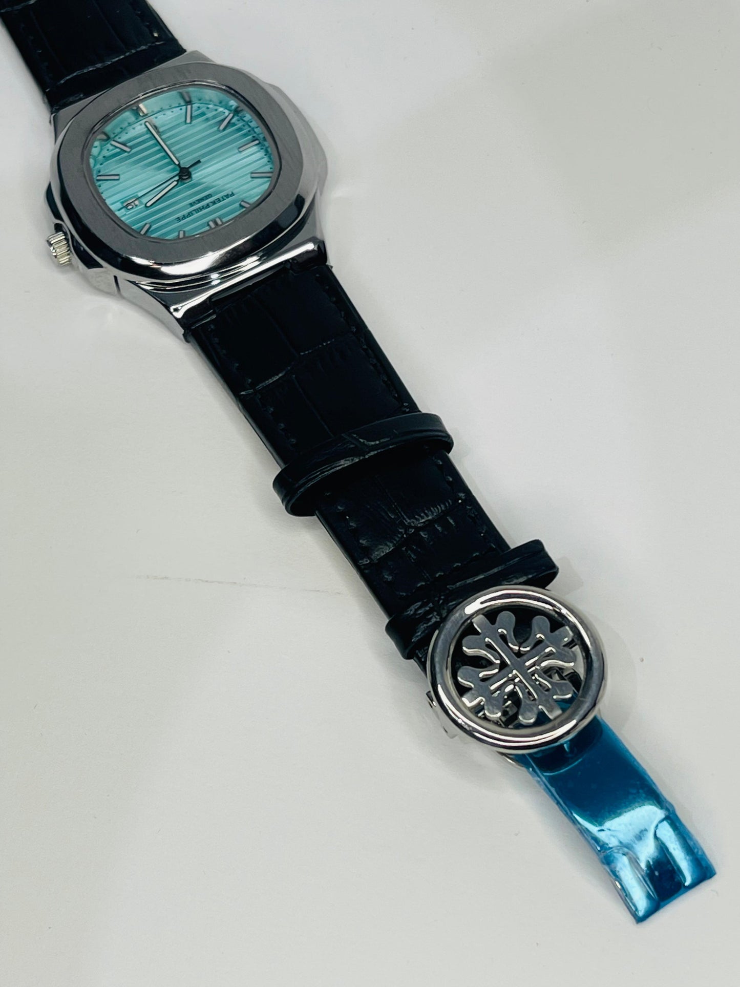 "Patek Philippe Sera Blue dial with Black leather strap watch"