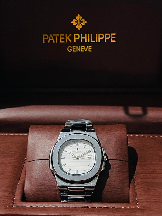 "PP Silver with white dial with date"