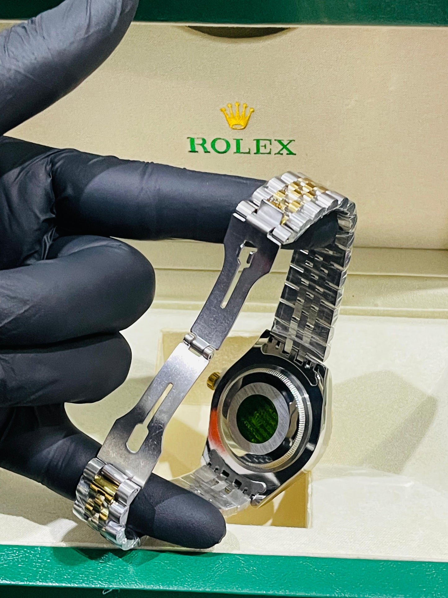 "Rolex oyster perpetual truetone with golen dial with date"