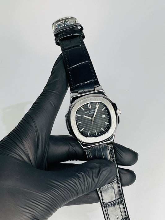 "Patek Philippe black dial with black leather strap watch"